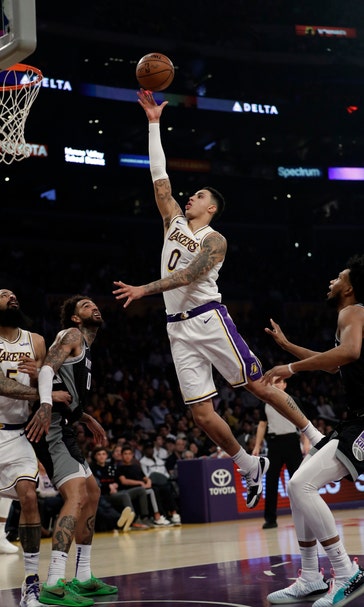 Lakers ride Kuzma’s hot 3rd to beat Kings 111-106